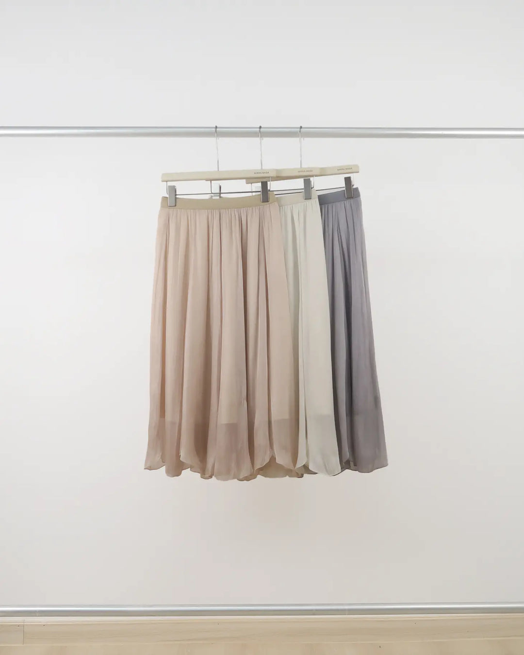 An image of a   Q3335 Midi Skirt by  Mirra Masa