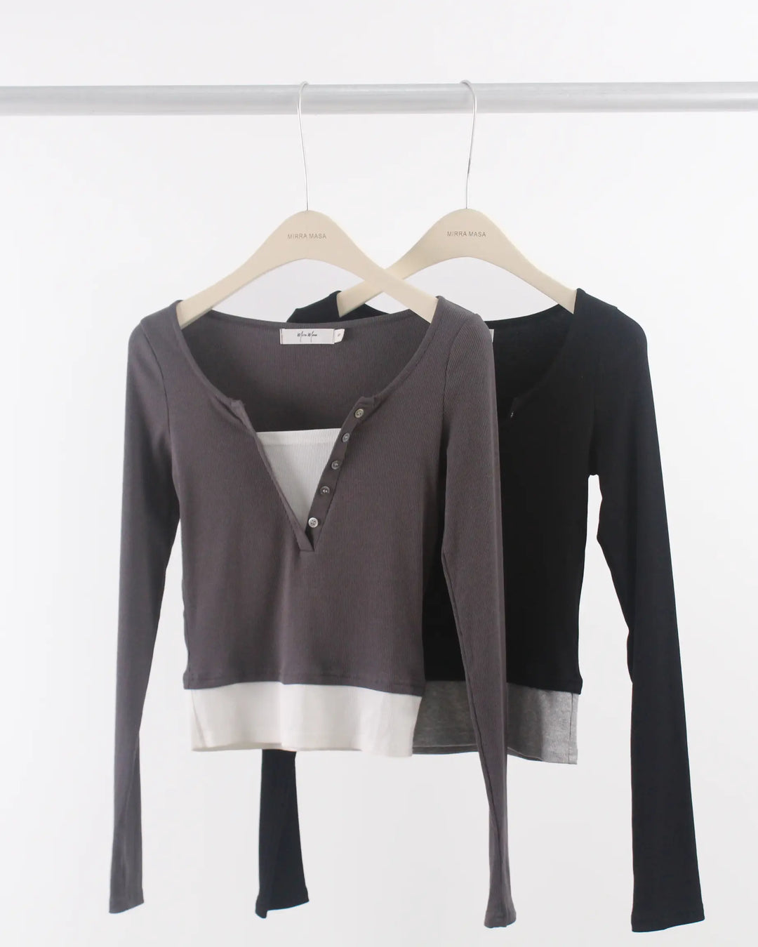 An image of a   S0532 Layered Knit Top by  Mirra Masa