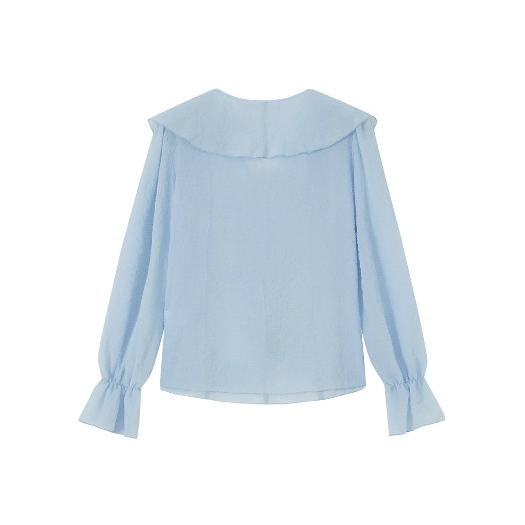 An image of a   S8805 Ruffled Blouse by  Mirra Masa