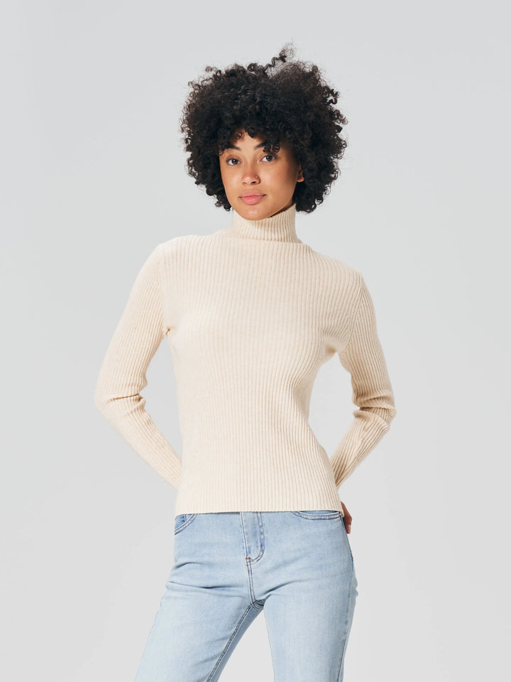 An image of a  Almond-One-Size T3191 Ribbed Turtleneck Sweater by  Mirra Masa