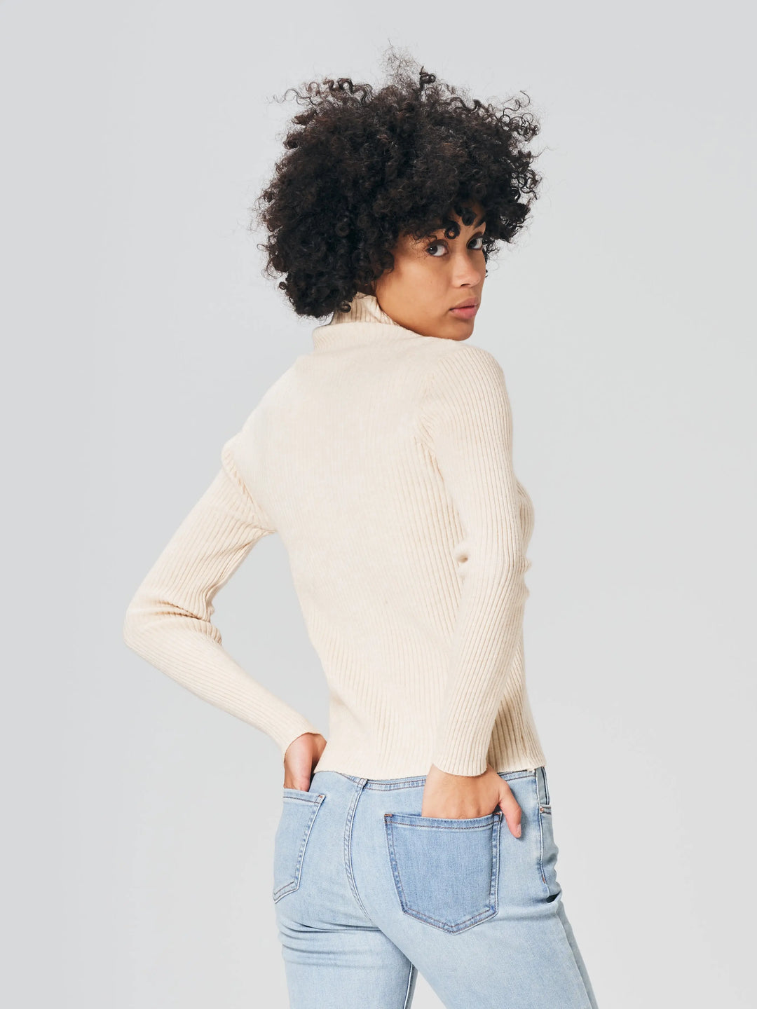 An image of a   T3191 Ribbed Turtleneck Sweater by  Mirra Masa