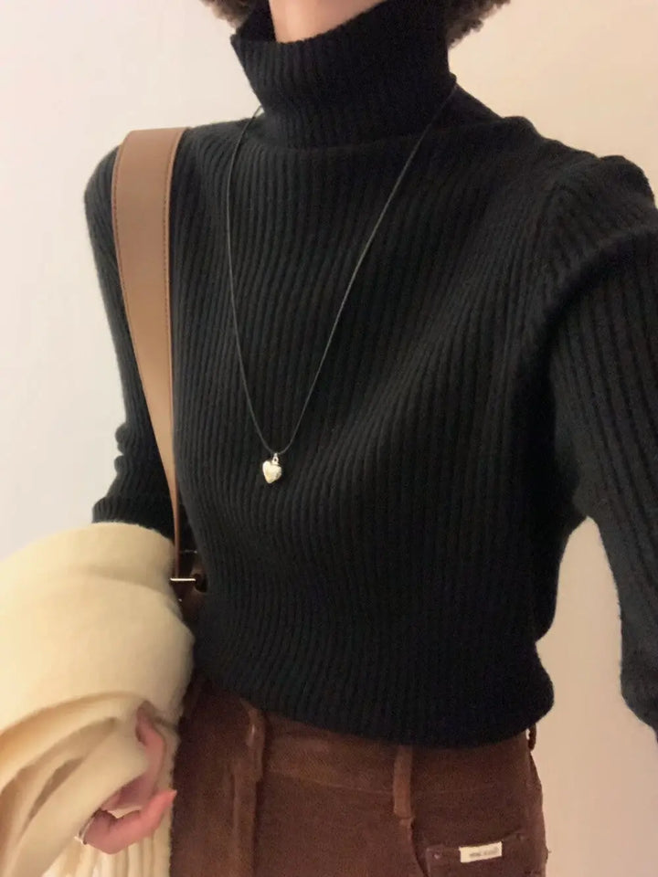 An image of a  Black-One-Size T3191 Ribbed Turtleneck Sweater by  Mirra Masa