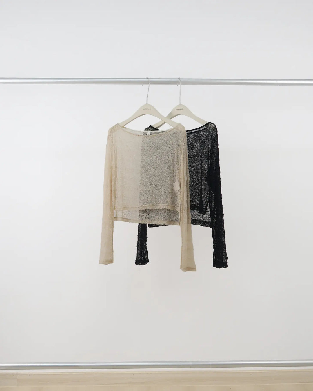 An image of a   U753 Knit Top by  Mirra Masa